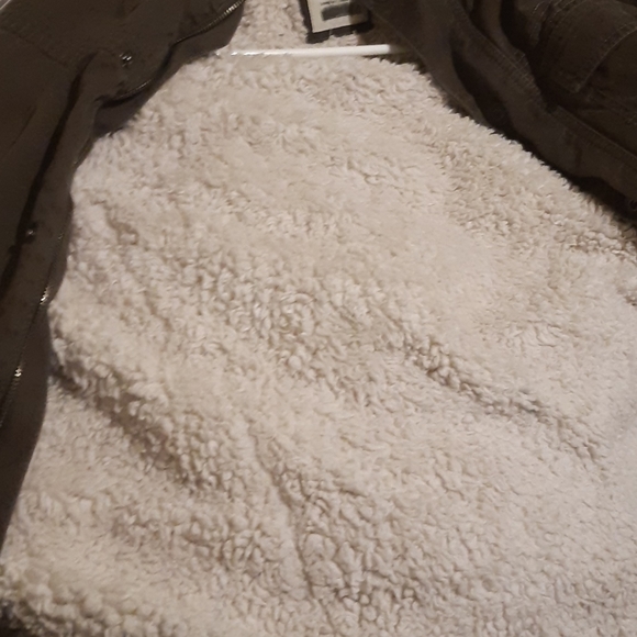 It's a gray jacket with soft fur on the inside - Picture 2 of 3